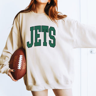 Jets Collegiate Letter Graphic Sweatshirt + Hoodie