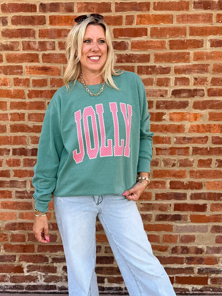 Pink Christmas sweatshirt for women with Jolly polka dot lettering