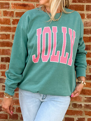 Jolly pink polka dot Christmas sweatshirt on Comfort Colors fleece in light green