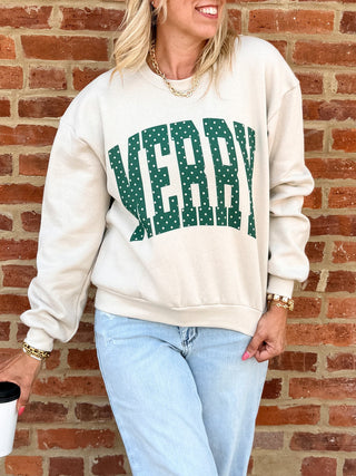 Bone fleece Christmas sweatshirt with green polka dot Merry design and balloon sleeves