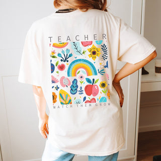 Teacher Watch Them Grow Back Print Comfort Color Graphic Tee - Limeberry Designs